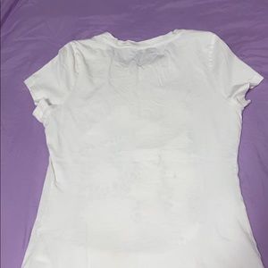 I am selling a white guess shirt.